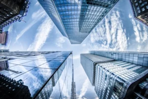 low-angle-photo-of-four-high-rise-curtain-wall-buildings