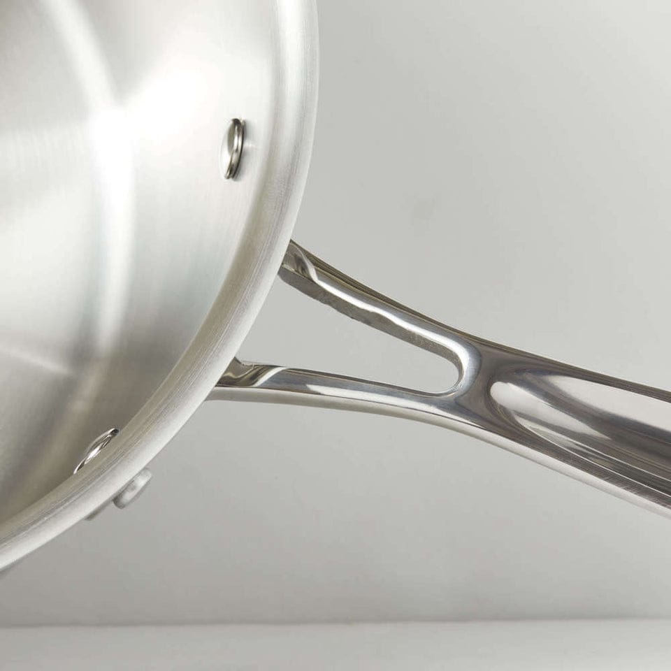 Close-up of clean stainless steel cooking surface